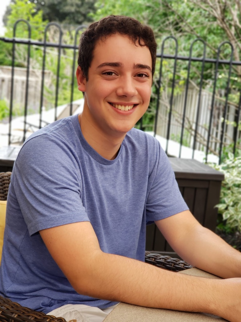 Picture of Andrew Hocking sitting outside, looking particularly handsome.